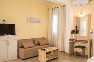 TV a/nebo společenská místnost v ubytování Moros Apartments