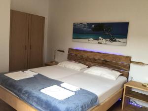 Posteľ alebo postele v izbe v ubytovaní Apartmani Misic