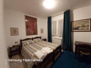 Posteľ alebo postele v izbe v ubytovaní Bed & Breakfast 4U PARCHEGGIO INTERNO