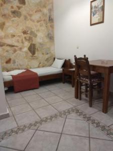A bed or beds in a room at Villa Giorgos