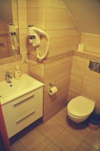 Kúpeľňa v ubytovaní Apartamenty Pałacowe