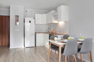 Kuchyňa alebo kuchynka v ubytovaní Elite Apartments Marine Suite