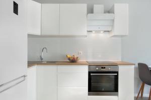 Kuchyňa alebo kuchynka v ubytovaní Elite Apartments Marine Suite