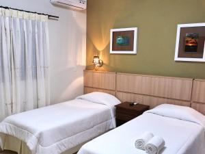 Кровать или кровати в номере CLH Suites Bonito Sul