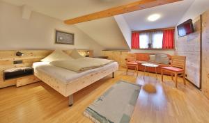 Posezení v ubytování Hotel Pension Geiger