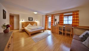 Posezení v ubytování Hotel Pension Geiger
