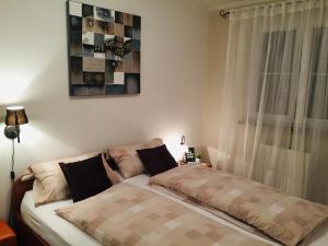 Postel nebo postele na pokoji v ubytování Apartment Ines