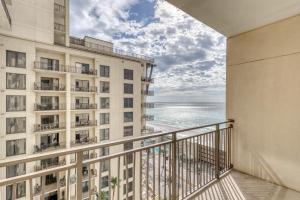 a balcony with a view of the ocean at Origin at Seahaven in Panama City Beach