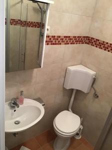 Kúpeľňa v ubytovaní Apartmani Misic