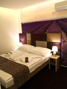 Postel nebo postele na pokoji v ubytování Hotel & Spa Meydan