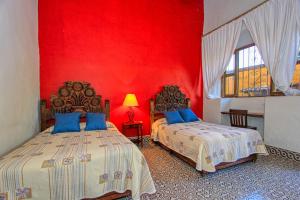 Postel nebo postele na pokoji v ubytování Hotel Sautto