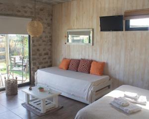 Giường trong phòng chung tại Piedra Mora Loft