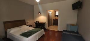 Pousada Fazenda Sant’Ana客房内的一张或多张床位