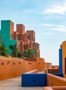 una representación de un edificio en el desierto en Club Regina Los Cabos, en San José del Cabo