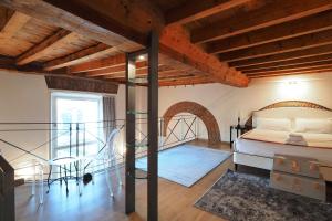 Posteľ alebo postele v izbe v ubytovaní Unique Duomo Luxury Property