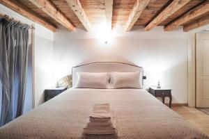 Posteľ alebo postele v izbe v ubytovaní Unique Duomo Luxury Property