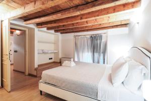 Posteľ alebo postele v izbe v ubytovaní Unique Duomo Luxury Property