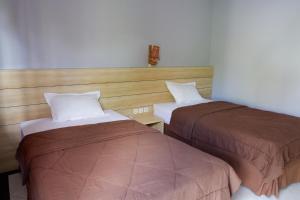 Кровать или кровати в номере Devata Giri