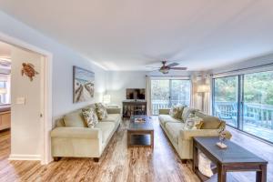 a living room with a couch and a table at 204 Dry Dock in Myrtle Beach