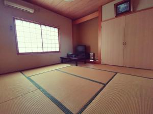 TV a/nebo společenská místnost v ubytování たから温泉民宿 Gem Onsen Stay
