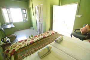 Letto o letti in una camera di Sneh Deep Guest House