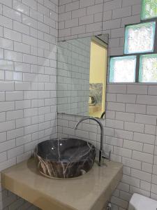 Koupelna v ubytování Budchui Guesthouse