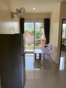 Kuchyň nebo kuchyňský kout v ubytování Budchui Guesthouse