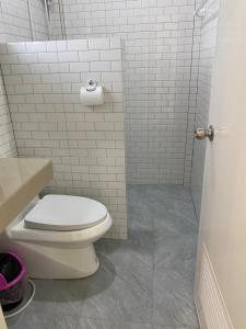 Koupelna v ubytování Budchui Guesthouse