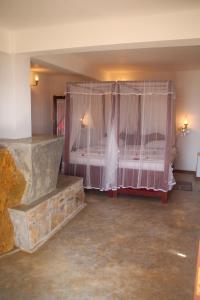 Postel nebo postele na pokoji v ubytování Shanthi Beach Resort