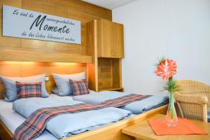 Postel nebo postele na pokoji v ubytování Hotel Waldblick
