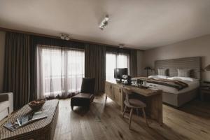 Sjónvarps- og/eða afþreyingartæki á Eco & Wellness Boutique Hotel Sonne
