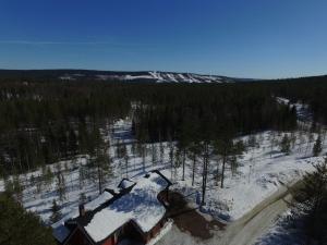 an aerial view of a house in the snow at Metsorinne in Kotila +24 photos