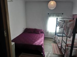 Łóżko lub łóżka w pokoju w obiekcie Maribella chambres à louer