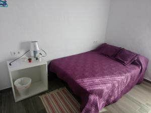 Łóżko lub łóżka w pokoju w obiekcie Maribella chambres à louer