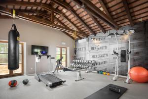 Fitness centrum a/nebo fitness zařízení v ubytování Meneghetti Wine Hotel and Winery - Relais & Chateaux
