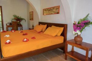 Postel nebo postele na pokoji v ubytování Eva Lanka Hotel - Beach & Wellness