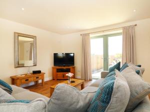 Televiisor ja/või meelelahutuskeskus majutusasutuses Elm Cottage