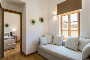 Postel nebo postele na pokoji v ubytování Aelios Design Hotel