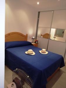 Cama o camas de una habitación en apartamento en playa de las Canteras, Las Palmas de Gran Caaria, islas Canarias, Gran Canaria.