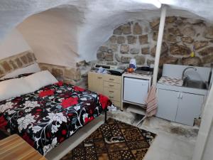 En eller flere senge i et værelse på Dar Jacaman - In the heart of Bethlehem old city