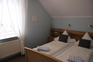 Ein Bett oder Betten in einem Zimmer der Unterkunft Gästehaus Sophie Randa