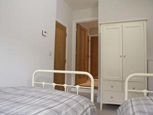 Postel nebo postele na pokoji v ubytování 3 Eddystone Row