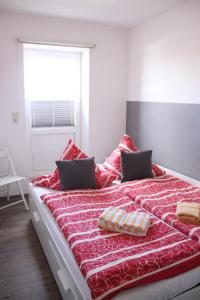 Ein Bett oder Betten in einem Zimmer der Unterkunft Gästehaus Sophie Randa