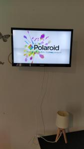 TV a/nebo společenská místnost v ubytování agnës