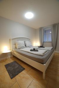 Cama o camas de una habitación en Apartment Bürgerstraße