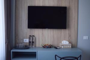 TV a/nebo společenská místnost v ubytování Villa Alisia