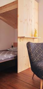 A bed or beds in a room at Ahoi