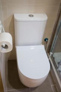 Kúpeľňa v ubytovaní Apartamentos RISCOS