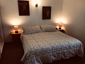 Letto o letti in una camera di Hotel Luanco
