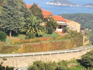 a house on the side of a road at Villa Shanti Yoga & Meditation in Marciana